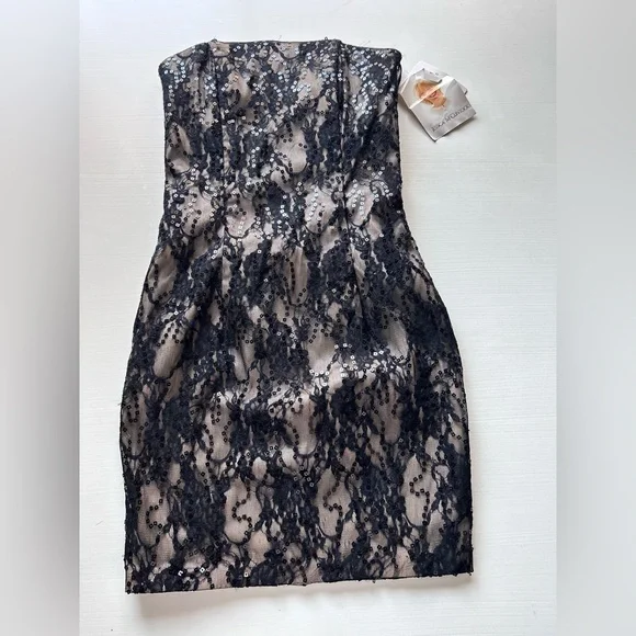jessica mcclintock strapless lace dress Early 2000s Jessica McClintock lace strapless dress. How cute is this for grad? Or a nontraditional wedding dress? Or even to grab cocktails this weekend! Fits a size small Get all the